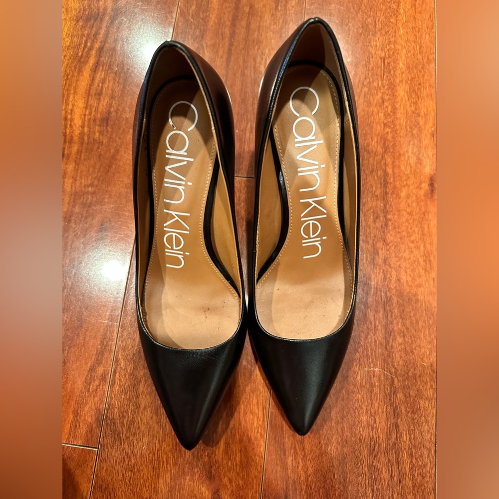 sleek and elegant black calvin klein heels